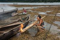Moken Women are Sealing Their Boats, Myanmar