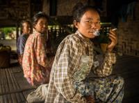 Chin Women Relaxing in a Home by the Chindwin River, Myanmar
