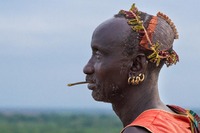 Karo tribe: See more in the book: http://www.blurb.com/b/4633120-people-of-the-omo-valley-under-climate-and-other-p
