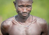 Mursi tribe:   See more in the book: http://www.blurb.com/b/4633120-people-of-the-omo-valley-under-climate-and-other-p