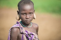 Mursi tribe:   See more in the book: http://www.blurb.com/b/4633120-people-of-the-omo-valley-under-climate-and-other-p