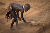 Mursi tribe:   See more in the book: http://www.blurb.com/b/4633120-people-of-the-omo-valley-under-climate-and-other-p