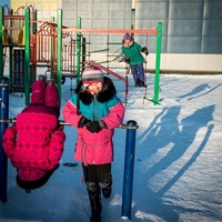 Inuit children playing in Kuujjuaq, Canada