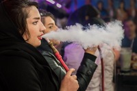 Modern Women Smoking Water Pipe in Tea Shop in Shiraz, Iran 