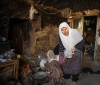 Traditional Woman in 3000-Year Old Maymand Troglodyte Village, Iran 