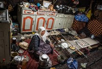 Woman in Her Home in the 3000-Year Old Maymand Troglodyte Village, Iran 