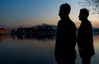 Men by by The Zyandé-Rud River, Iran