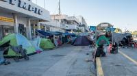 Refugees camping in Athens airport in Greece.