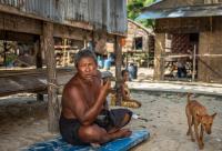 Moken Smoking in His Village, Myanmar